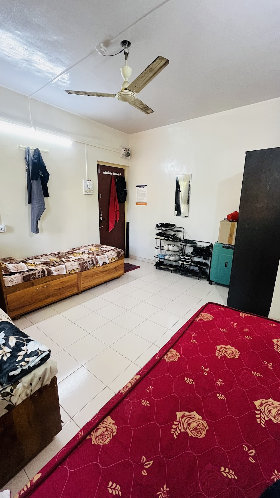 Spacious 3-Sharing Room with Wooden Cot Beds & Shoe Rack