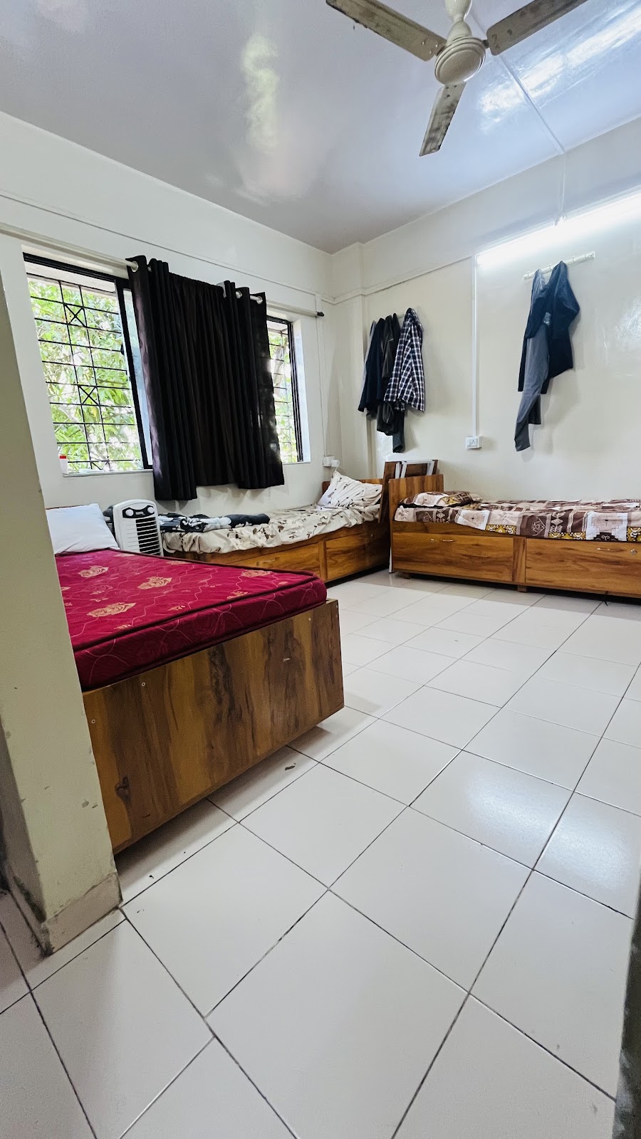 Corner Bedroom View with Large Window & Natural Airflow